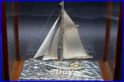 Hand crafted electroplated silver model of a sailing ship boat or yacht in case