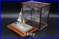 Hand crafted electroplated silver model of a sailing ship boat or yacht in case