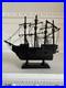Vintage-Wooden-Model-Ship-Black-Sailing-Vessel-with-Fabric-Sails-Nautical-Decor-01-vc