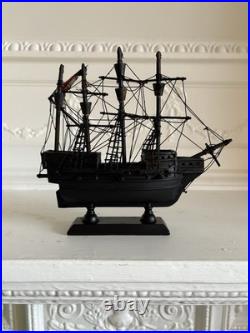Vintage Wooden Model Ship Black Sailing Vessel with Fabric Sails Nautical Decor