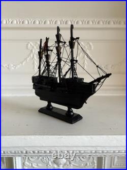 Vintage Wooden Model Ship Black Sailing Vessel with Fabric Sails Nautical Decor